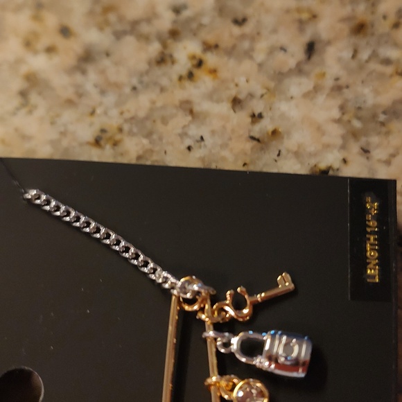 Nwt ladies Coach 2 toned safety pin necklace with charms - Picture 4 of 5